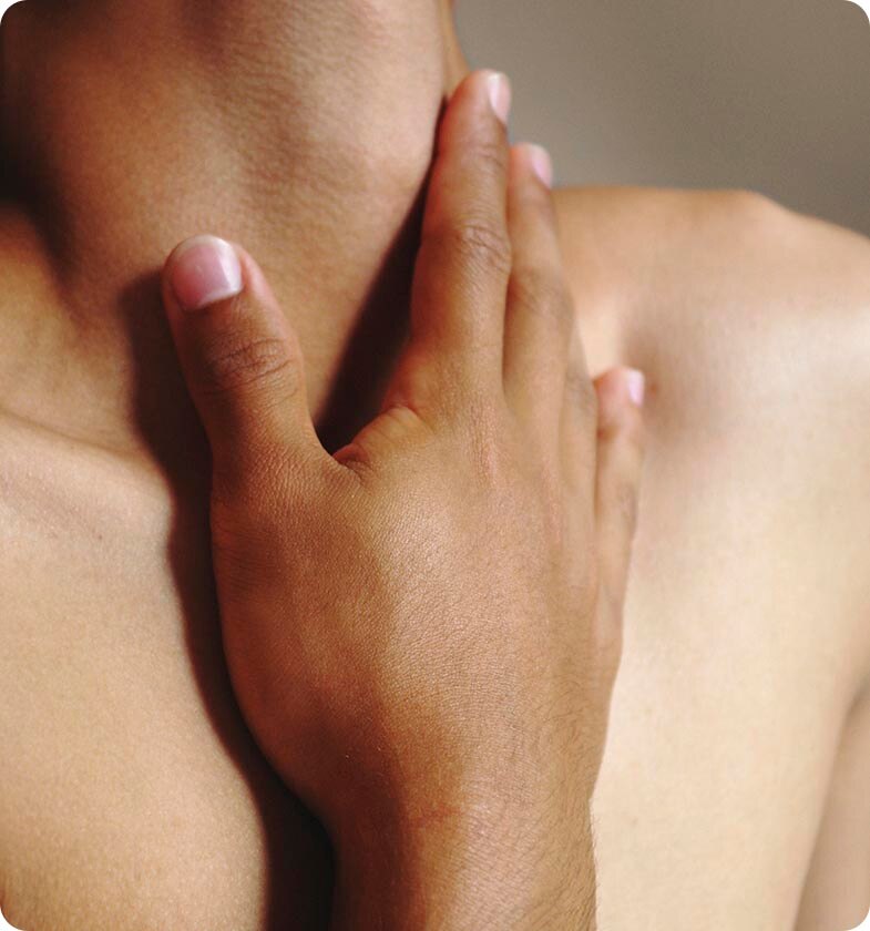 woman's hand holding neck woman's hand holding neck