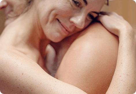 Naked Woman holding a naked man 